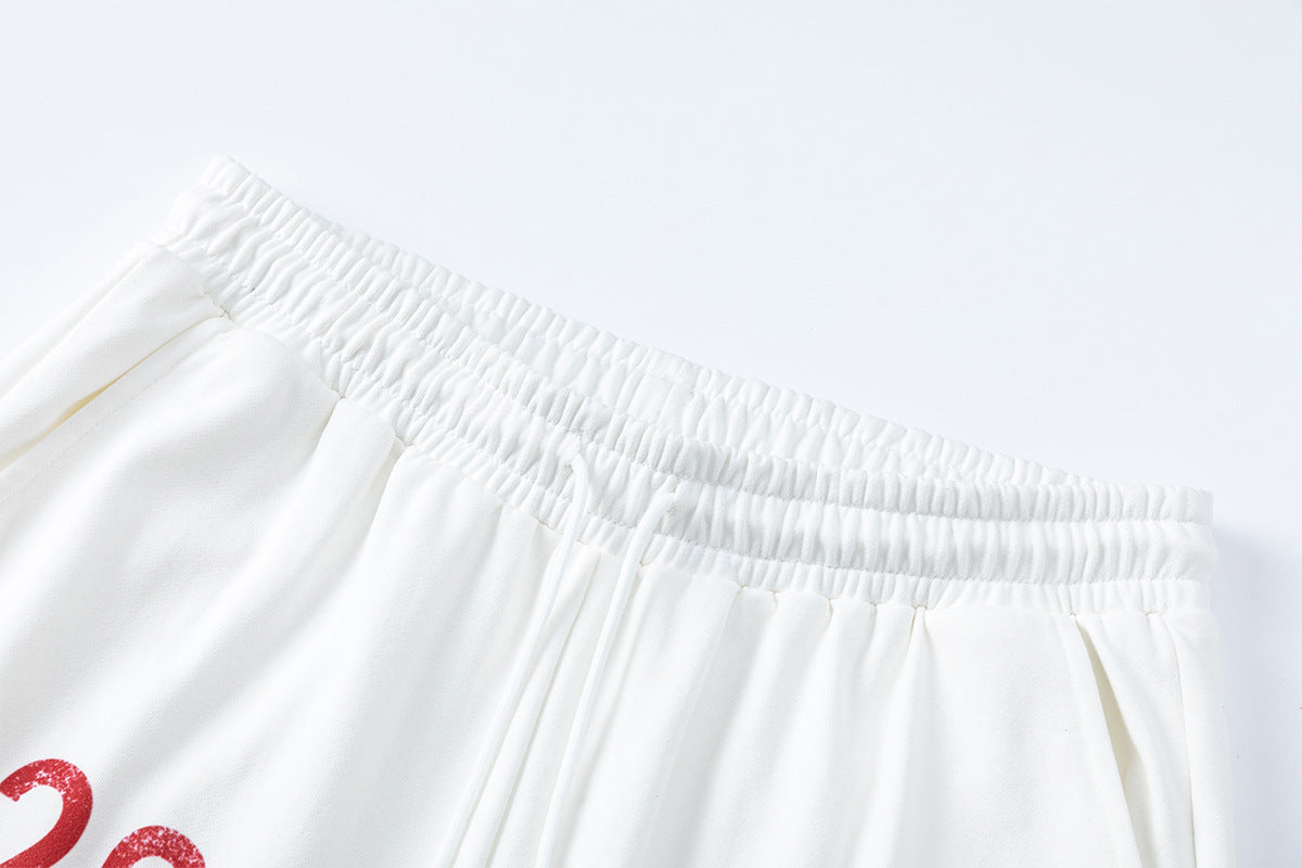 Pantalon de survêtement wide leg avec écusson varsity et motif graphique numéro 28