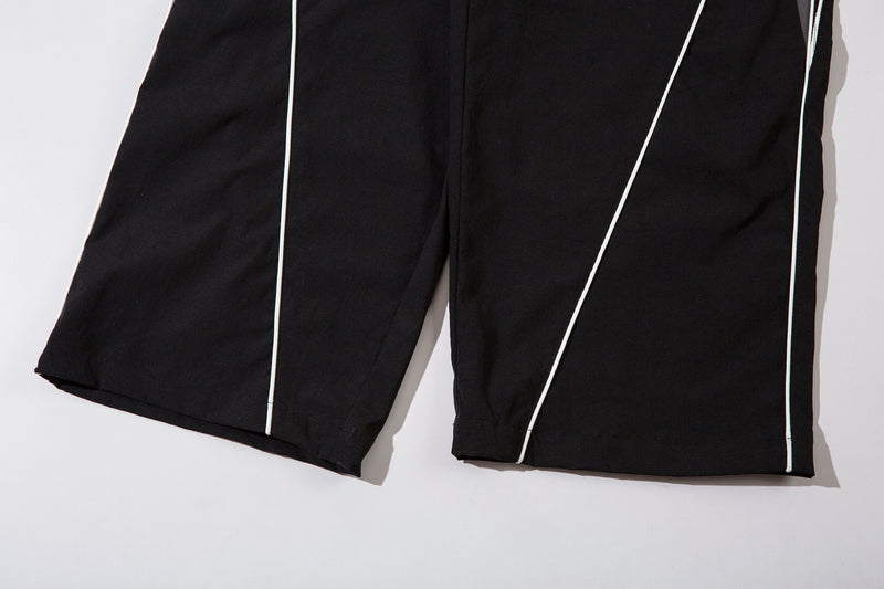 Herren-Trackpants mit kontrastierender Paspel und Colorblock-Seiteneinsätzen