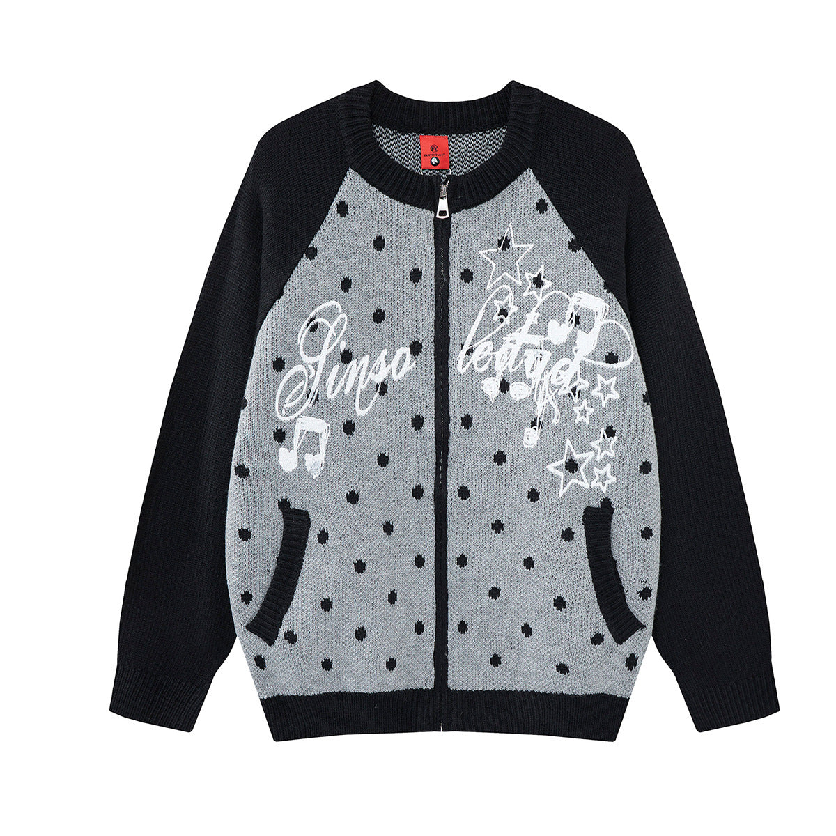 Cardigan zippé bicolore en maille à pois, motif étoile et inscription cursive sur la poitrine, présenté en bleu et noir