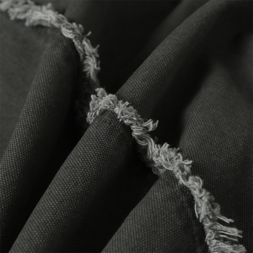 Blouson bomber déconstruit en toile à coutures effilochées et zip diagonal