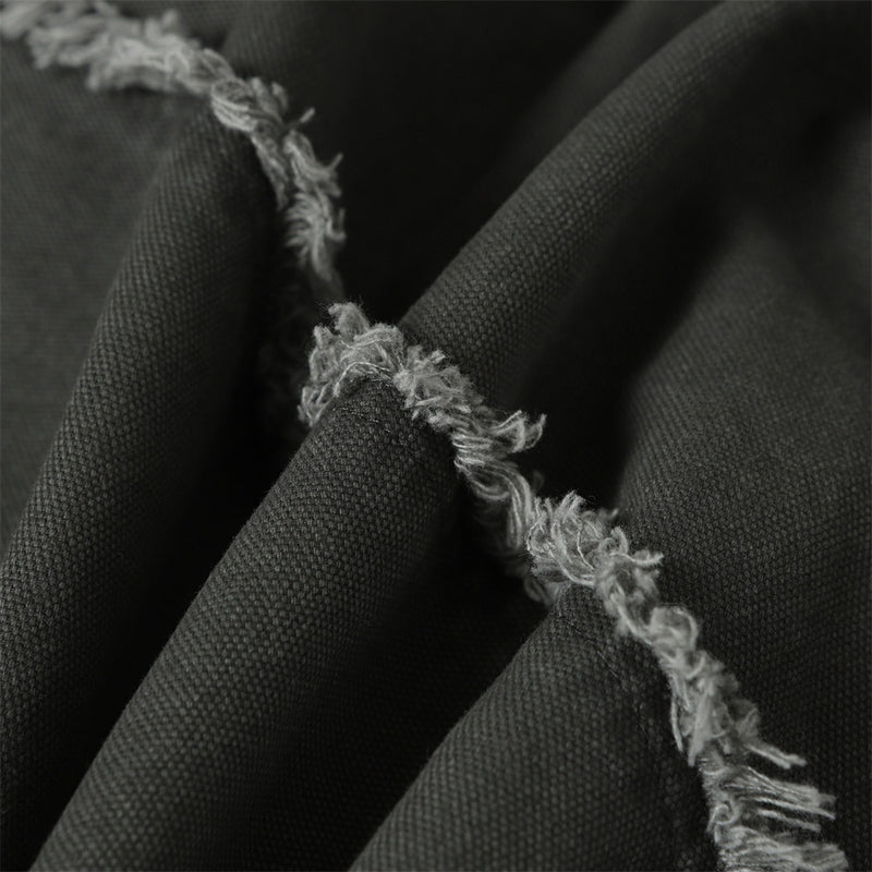 Blouson bomber déconstruit en toile à coutures effilochées et zip diagonal