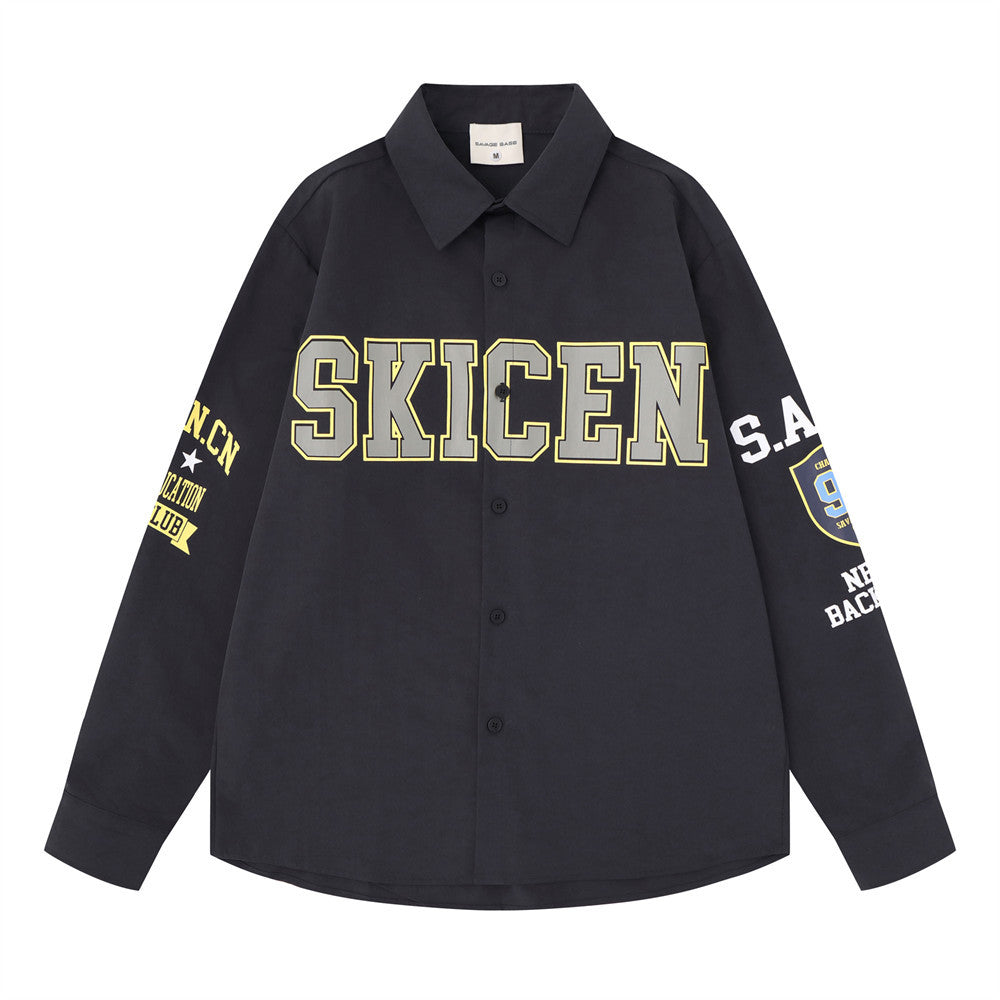 Oversized long sleeve button-up shirt with varsity SKICEN letter print on chest and sleeve graphics, shown in dark navy and w