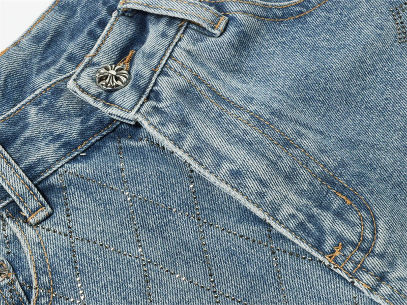 Close-up of light blue jeans front pocket, belt loop and stitched seam