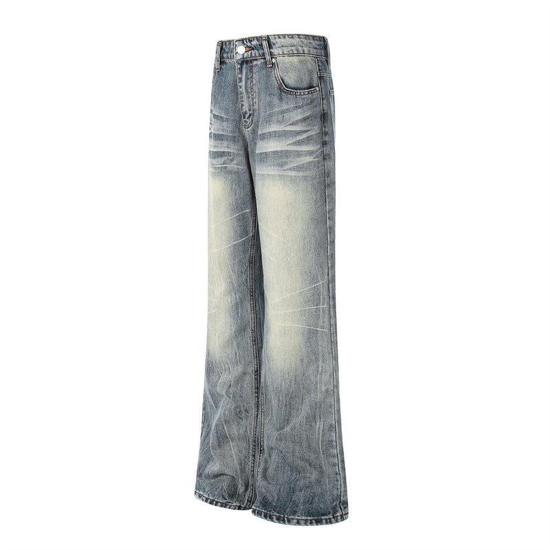 Vintage Washed Wide-Leg Flare Jeans – Distressed Faded Denim with Crease Detail