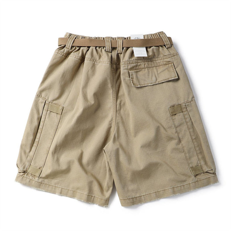 Back view of khaki cargo shorts with elastic waistband and flap back pocket