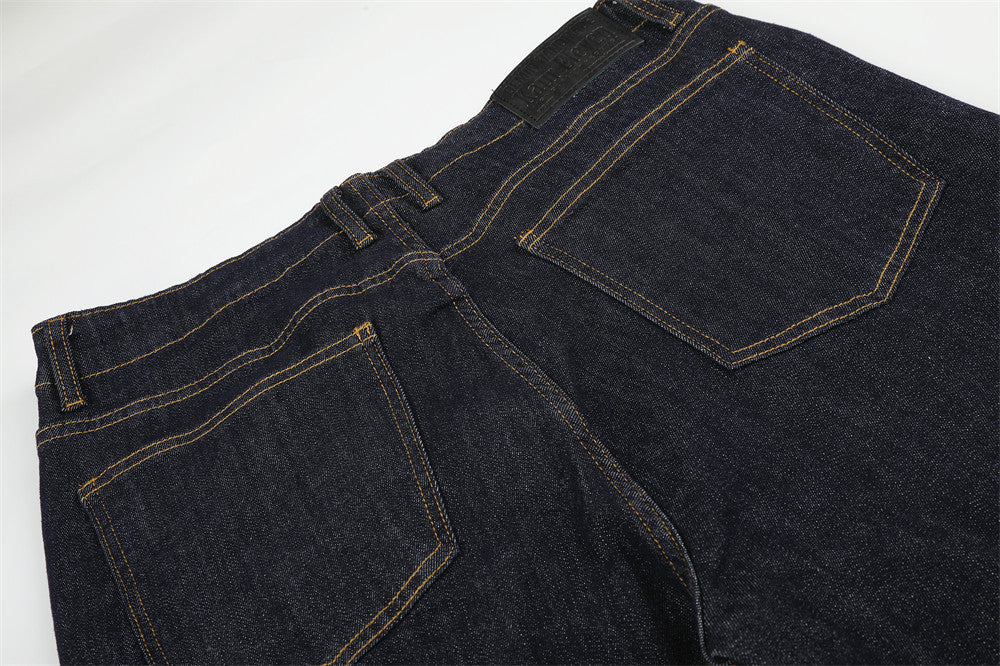 Wide-Leg Flare Jeans with Embossed Pocket Detail – Dark Indigo