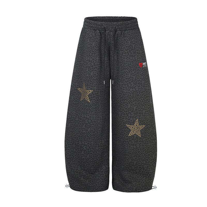 Pantalon de survêtement léopard à jambes larges avec étoiles dorées cloutées