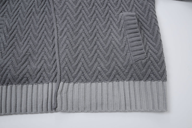 Cardigan en maille torsadée chevrons avec col châle et poches avant