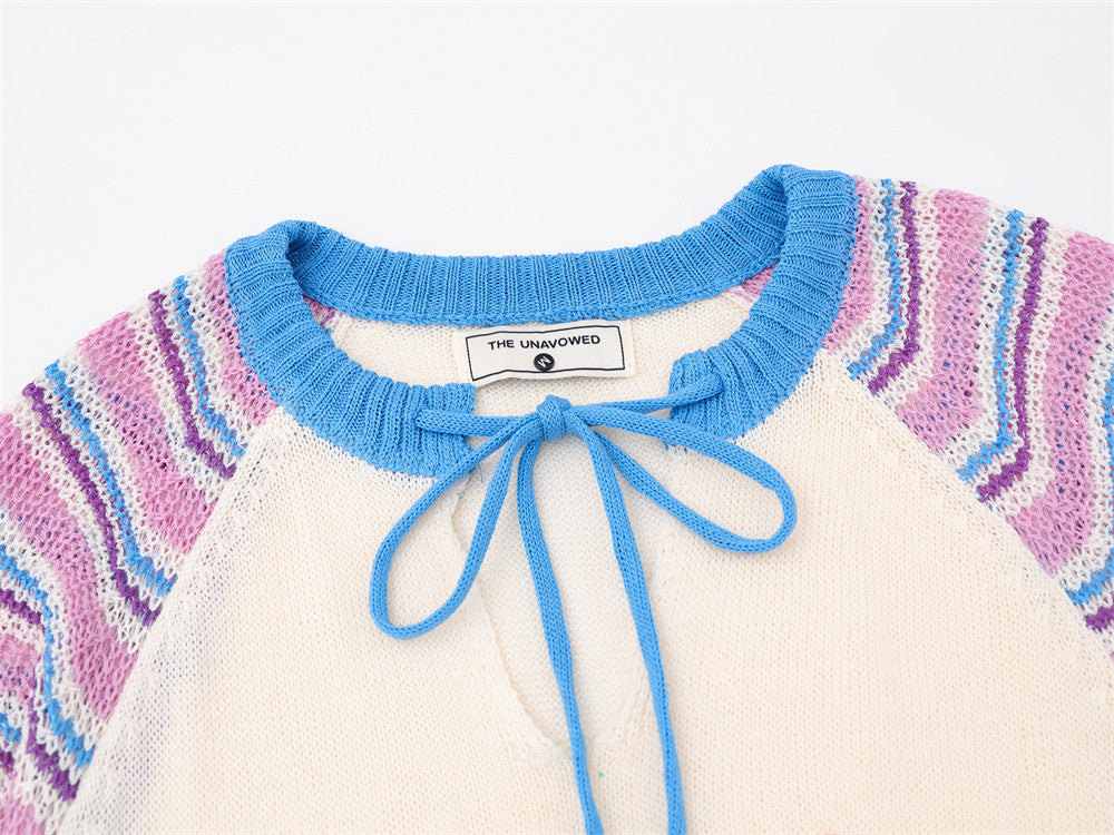 Pull en maille rayé colorblock à manches raglan avec col à lien
