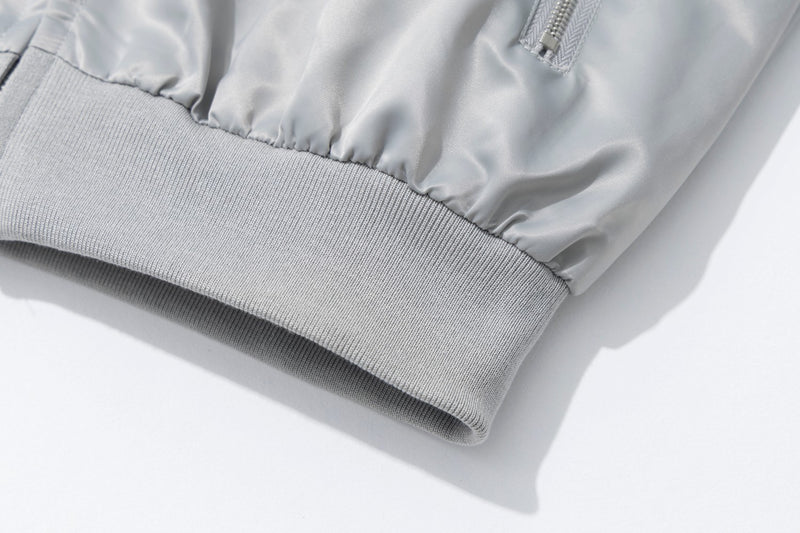 Blouson bomber satiné brodé à col montant et bandes léopard