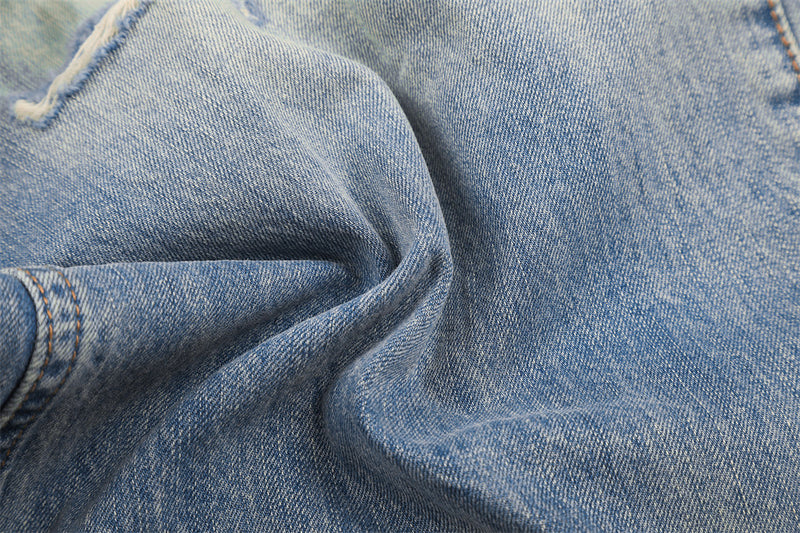 Wide-Leg Distressed Jeans – Gradient Washed Denim with Ripped Details