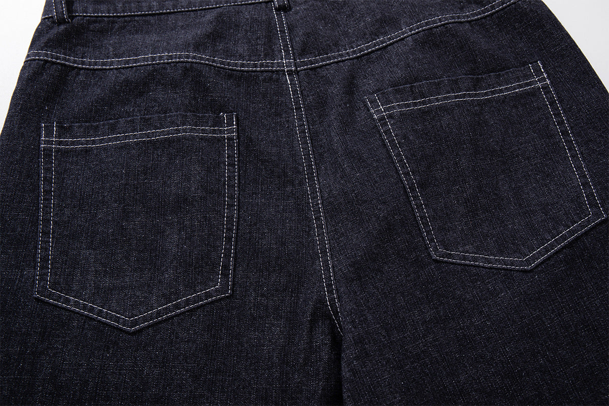 Vaqueros baggy de pierna ancha, lavado oscuro, bragueta diagonal de botones y denim crudo