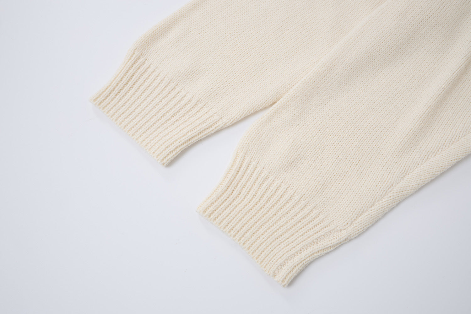 Pull à capuche oversize en maille jacquard avec grand motif graphique sur le devant