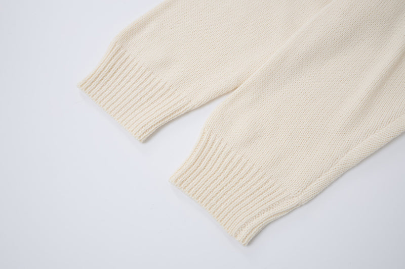 Pull à capuche oversize en maille jacquard avec grand motif graphique sur le devant