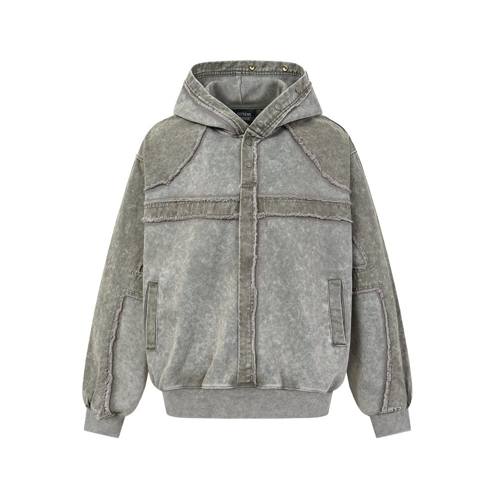 Veste à capuche oversize à enfiler, délavage acidulé, empiècements patchwork à bords francs, coloris vert-gris