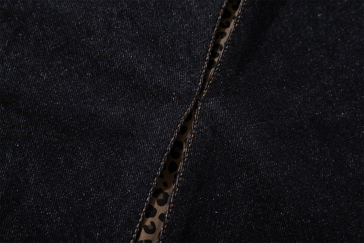 Vaqueros baggy negros con inserciones de estampado de leopardo y corte de pierna ancha