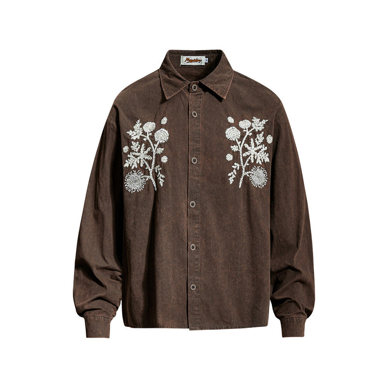 Oversized long-sleeve button-up shirt with white chrysanthemum embroidery on washed brown cotton fabric