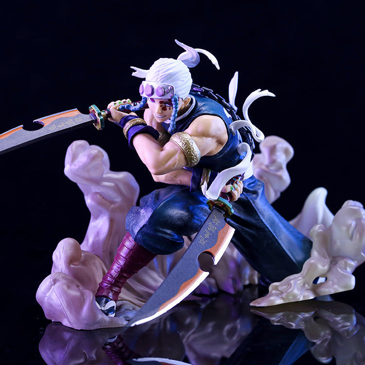 The 14CM Uzui Tengen Action Figure from Demon Slayer features a white-haired, goggled character with two large swords and a blue outfit accented in gold and purple. It is dynamically posed amid smoke effects on a black base, capturing the essence of the Sound Pillar.