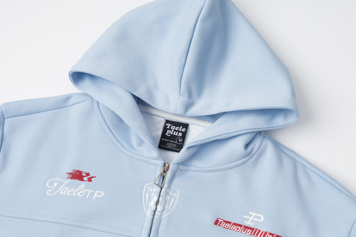 Sweat à capuche bleu zippé intégral avec patch brodé du numéro varsity 07