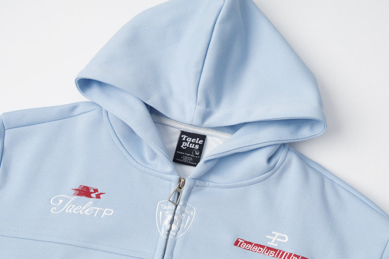 Sweat à capuche bleu zippé intégral avec patch brodé du numéro varsity 07