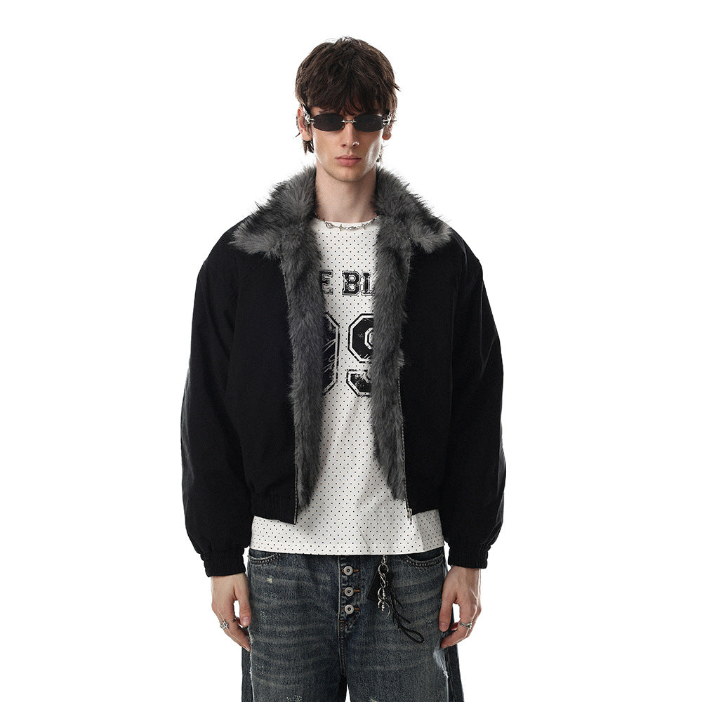 Men's oversized faux fur collar bomber jacket in black with grey fur trim, full zip, worn with jeans and graphic tee