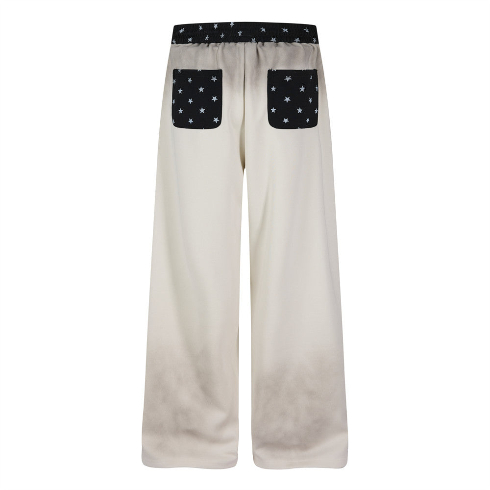 Pantalon de survêtement à jambes larges motif baroque – Imprimé usé, ceinture à étoiles