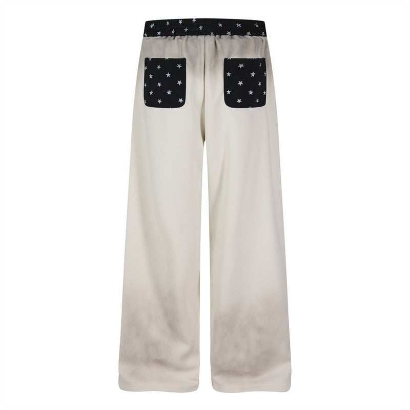 Pantalon de survêtement à jambes larges motif baroque – Imprimé usé, ceinture à étoiles