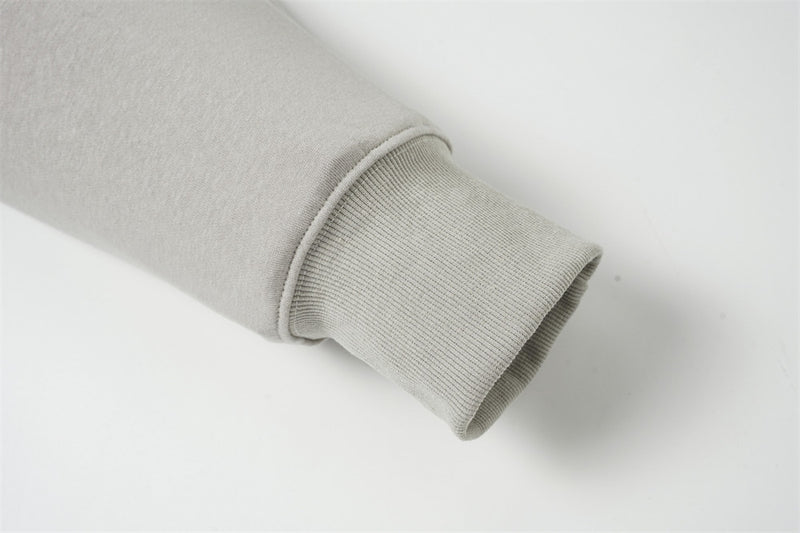 Sweat à capuche oversize zippé – Finition délavée usée, poches à multiples zips et bords bruts