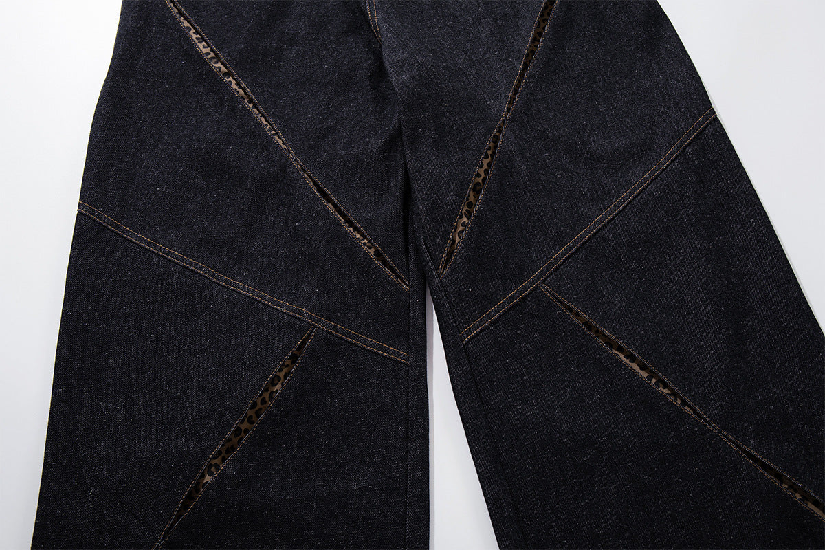 Vaqueros baggy negros con inserciones de estampado de leopardo y corte de pierna ancha