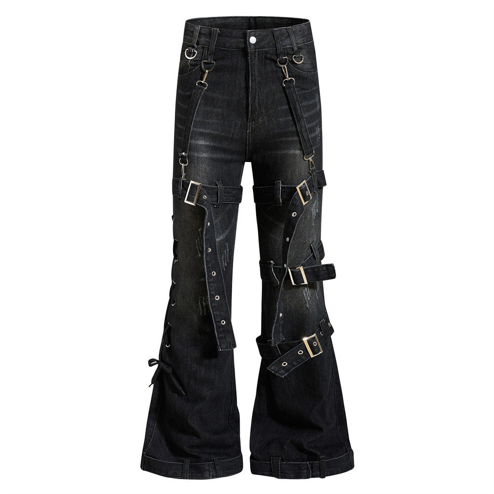 Men's gothic washed black flare jeans with front buckle harness straps, D-ring hardware, and wide distressed denim flare leg