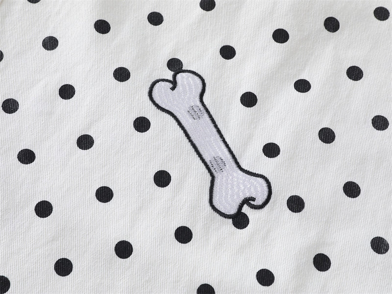 Pantalon baggy wide-leg à pois avec broderies cartoon dalmatien