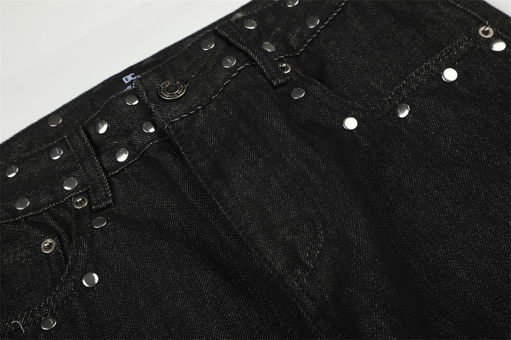 Jean bootcut noir pour homme avec rivets latéraux et patchs arrière étoile léopard