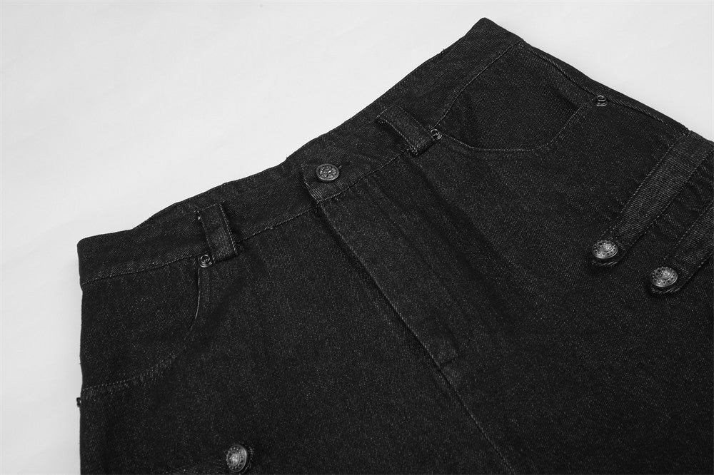 Close-up of black denim waistband and pleated front with button details