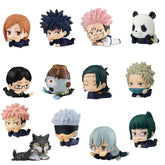 The Jujutsu Kaisen Chibi PVC 12-Piece Figure Set, featuring 4 cm collectible figures in playful lying-down poses, includes humans with various hairstyles and expressions, plus a panda and a dog.