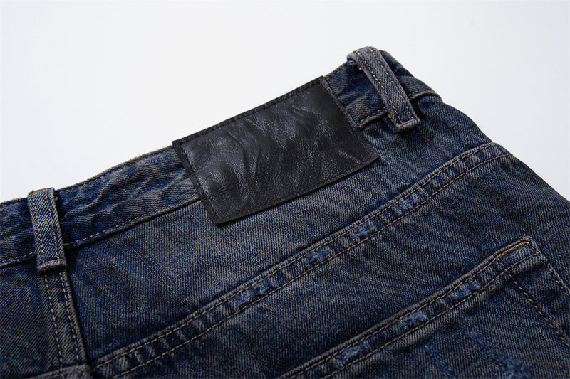 Wide-Leg Ripped Jeans – Vintage Washed Distressed Denim with Studded Patches