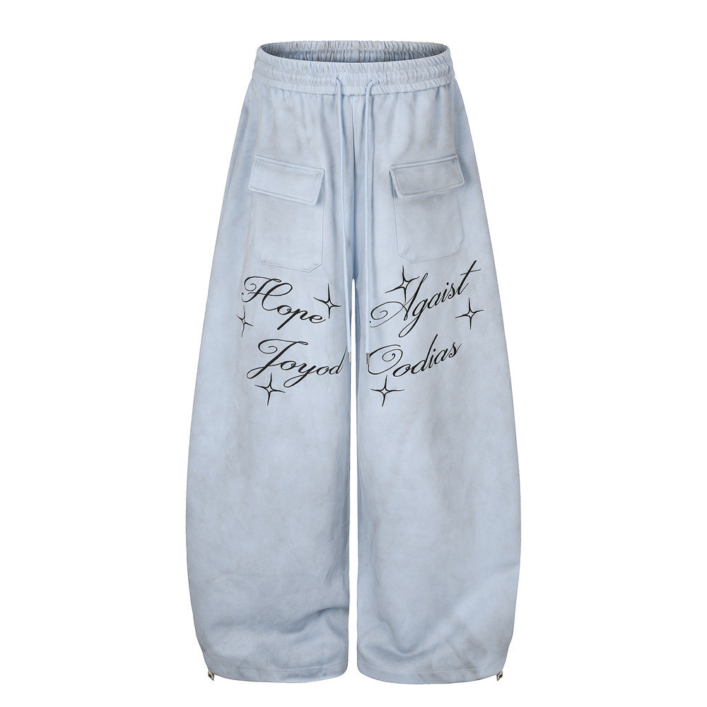Pantalon de survêtement en velours côtelé à jambes larges avec imprimé script et poches cargo