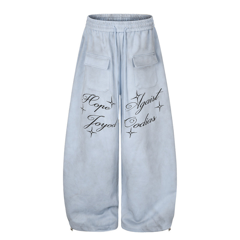 Pantalon de survêtement en velours côtelé à jambes larges avec imprimé script et poches cargo