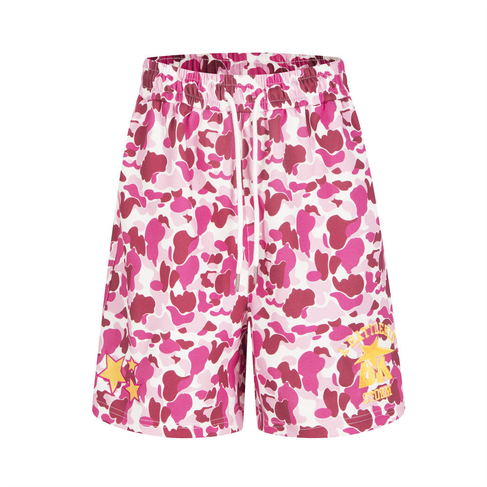 Men's camouflage print streetwear shorts with star embroidery in pink, blue, and green colorways