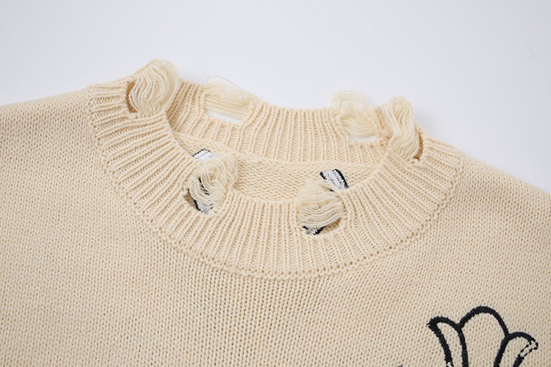 Pull en maille destroy à broderies croisées – Sweat oversize à col rond