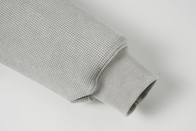 Sweat à capuche zippé quart de zip en maille gaufrée – Design bicolore déconstruit