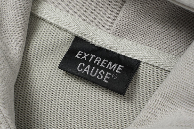 Sweat à capuche oversize zippé – Finition délavée usée, poches à multiples zips et bords bruts