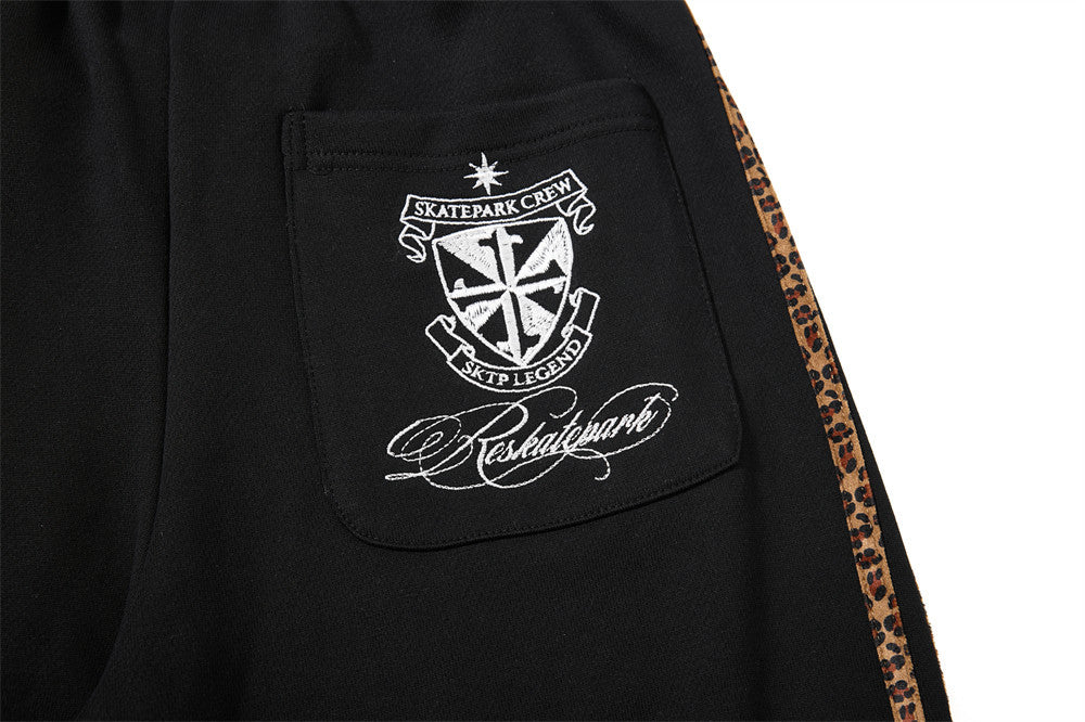 Dark Streetwear Wide-Leg Sweatpants with Leopard Side Tape & Script Print