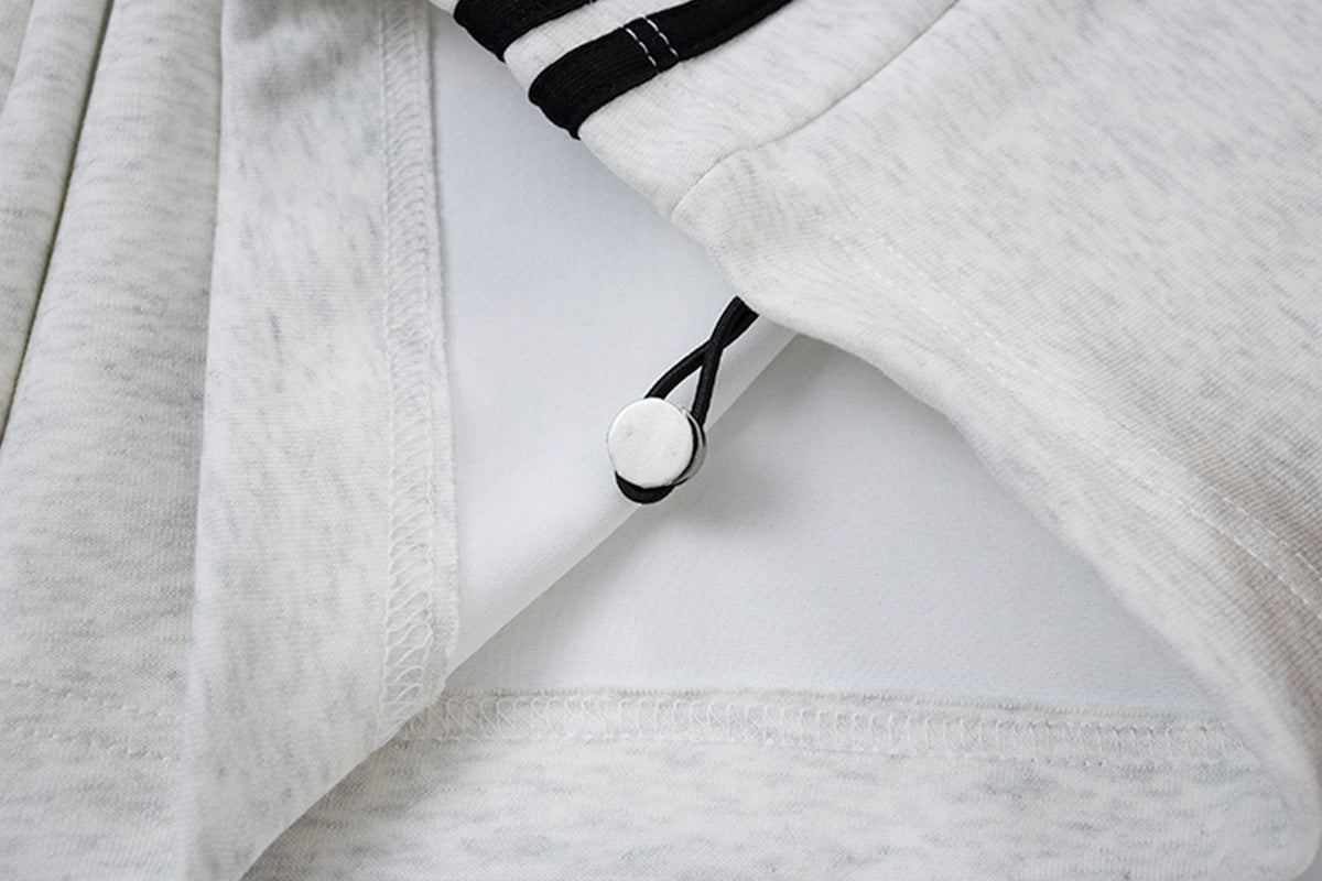 Pantalon de survêtement ample à jambes larges avec bandes latérales, fausse double ceinture et imprimé graphique
