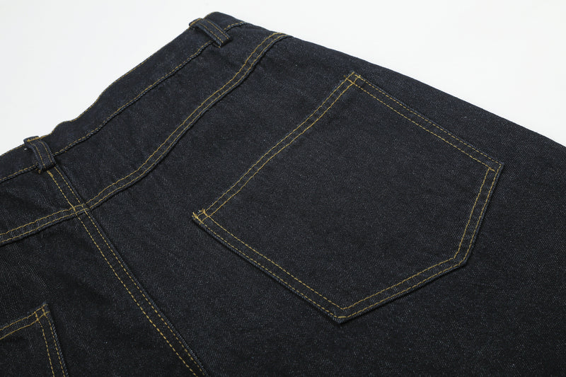 Jean baggy délavé foncé avec bas en fausse fourrure et broderie manuscrite – Coupe ample