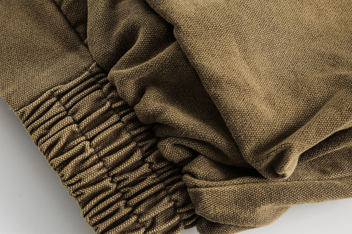 Blouson bomber homme en toile canvas délavée avec grandes poches cargo et col à boucle