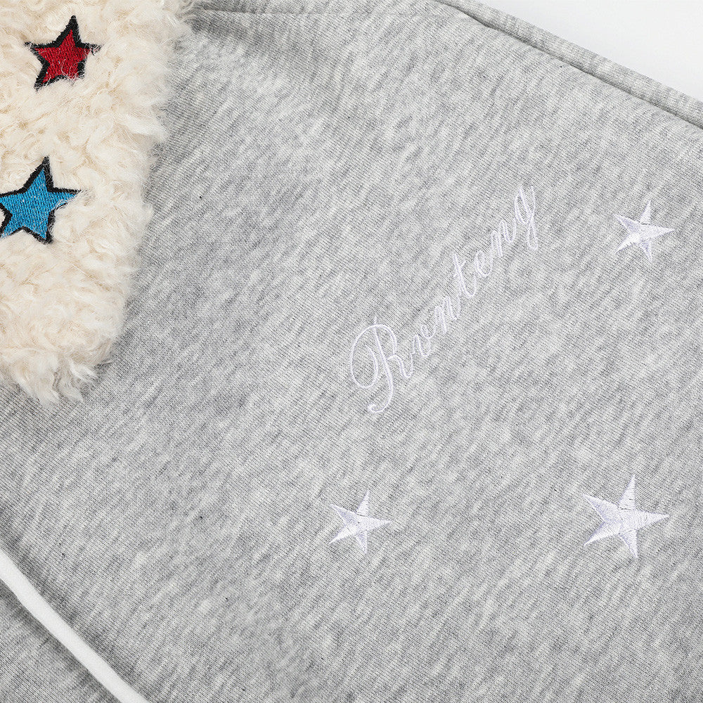 Sweatpants mit weitem Bein, Sternstickerei und umgeschlagenem Sherpa-Bund