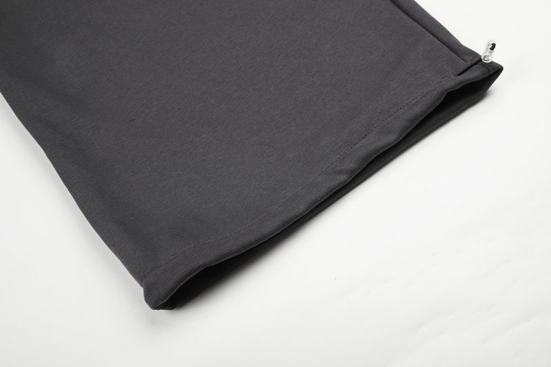 Gerade geschnittene Sweatpants – Colorblock-Baggy-Jogger mit Nieten-Grafik