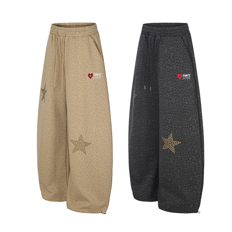 Pantalon de survêtement léopard à jambes larges avec étoiles dorées cloutées