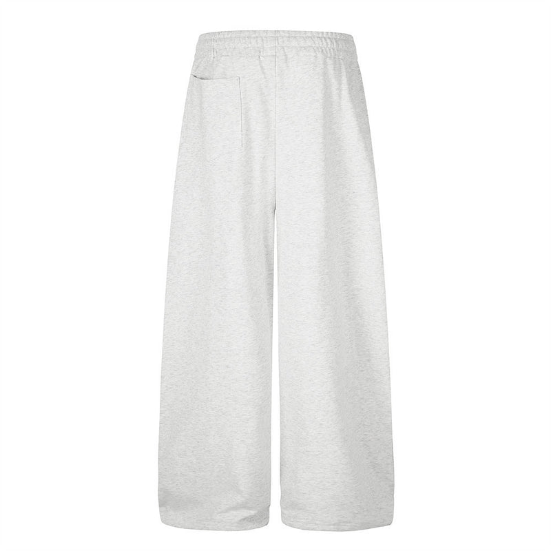 Jogging homme coupe large avec détails de boutons croisés et taille élastique