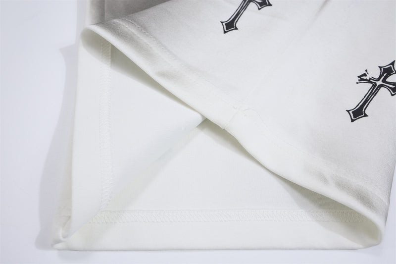 Pantalon de survêtement à jambes larges avec croix gothique et finition délavée